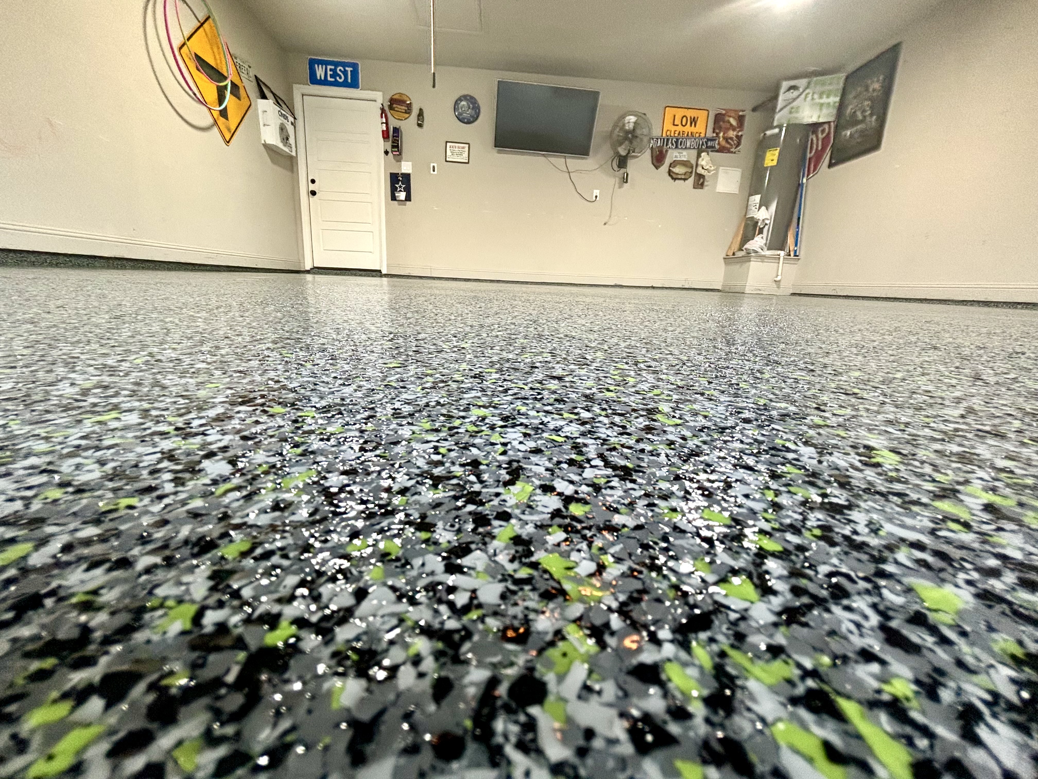Premium epoxy garage floor flooring by Carpenter Coating
